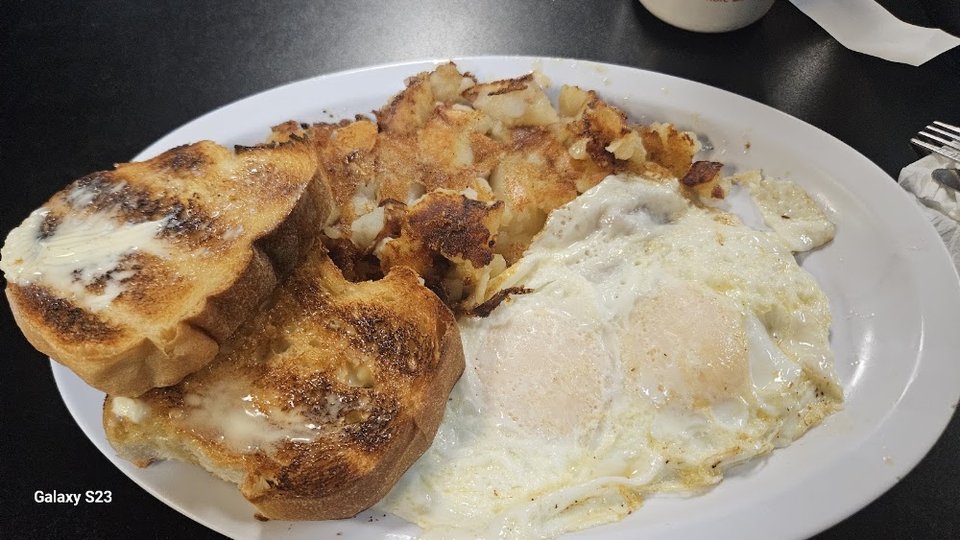 Eggs over Hash Browns and Italian Toast